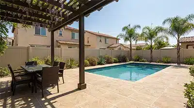 outdoor-pool-and-patio-area-in-murrieta-home-with-tile-floor-professionally-cleaned-by-shining-knight-tile-and-grout-cleaning-service